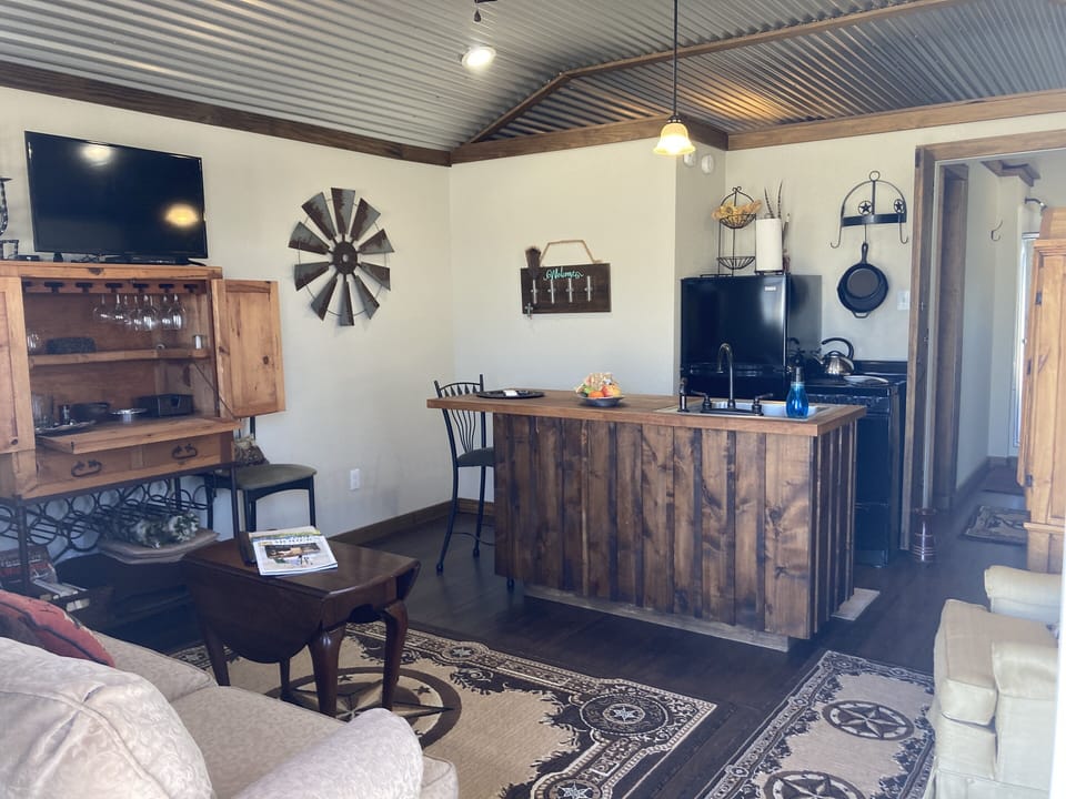 Adorable kitchen that is fully equipped.  Just bring food and drinks 