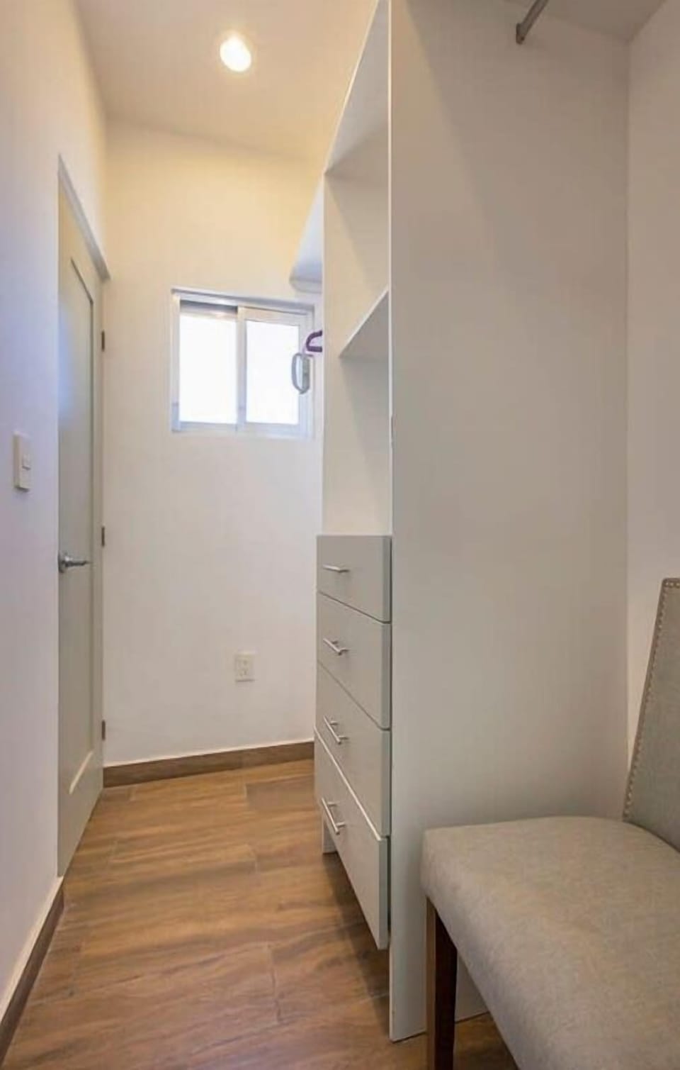 Head through the closet to Bathroom 2