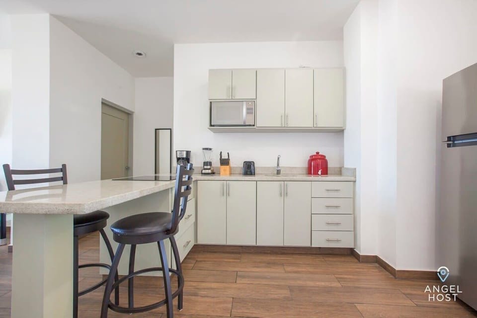 The kitchen is well equipped for preparing food at home
