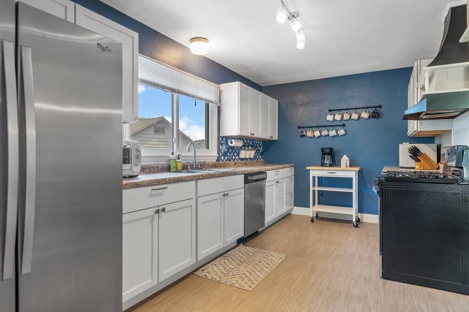 Kitchen Area, refrigerator, stove, oven, coffee maker, kitchen utensils