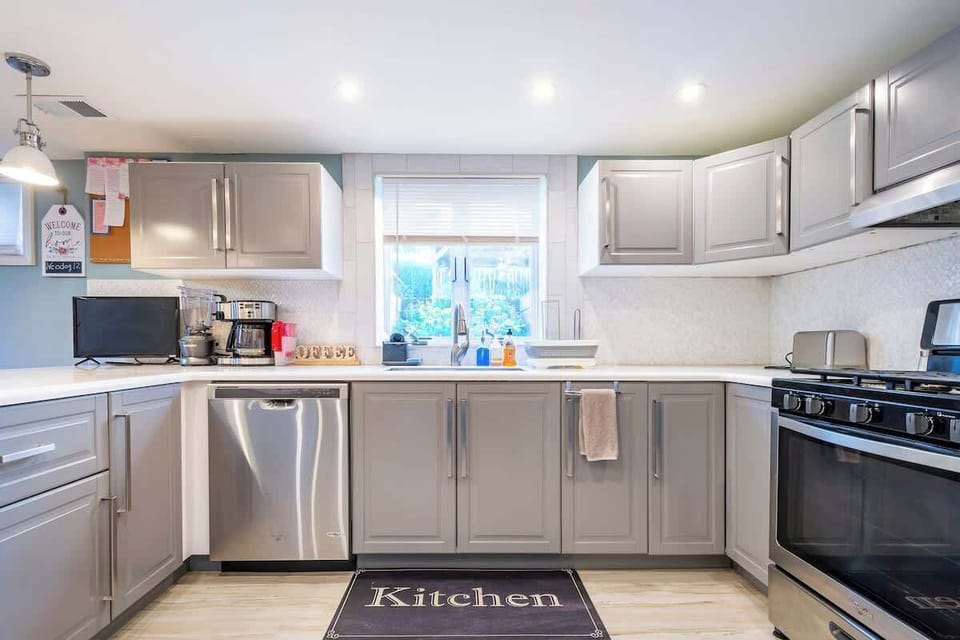 Lots of light in kitchen from full size casement windows. 