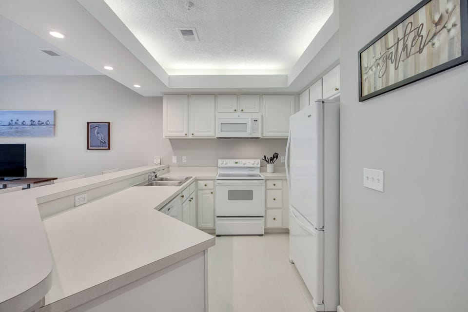 Full size refrigerator, dishwasher, electric stove & oven, washer & dryer