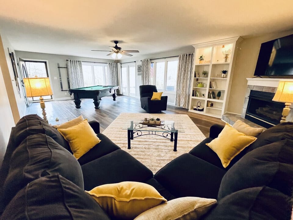 Enjoy the pool table, 75` HDTV and gas log fireplace