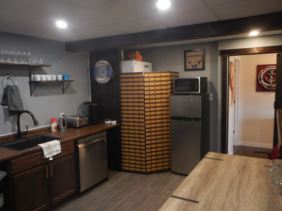 Full kitchen with washer and dryer.