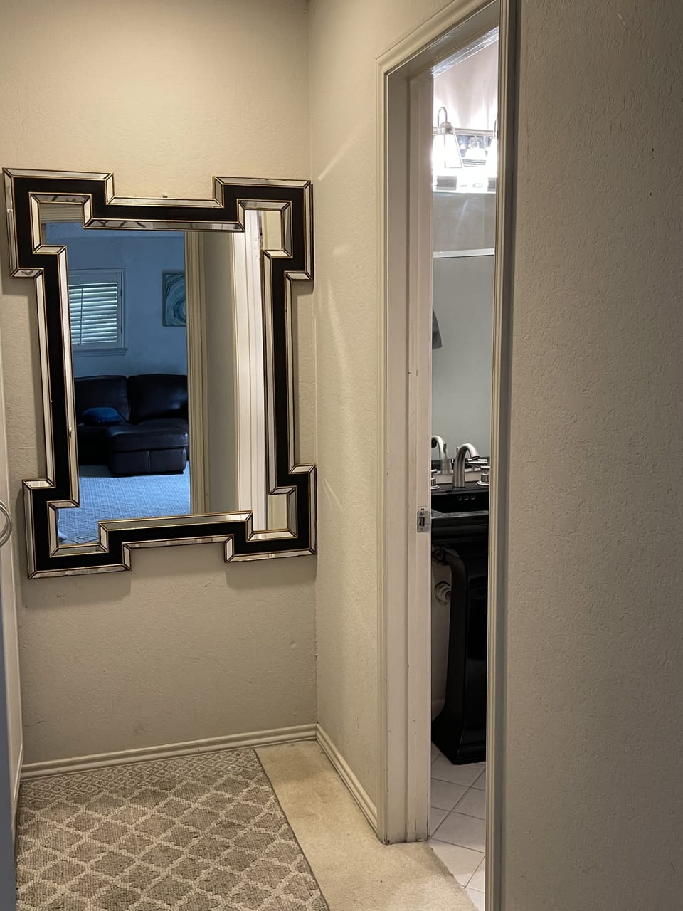 Dressing area between living area and bathroom 