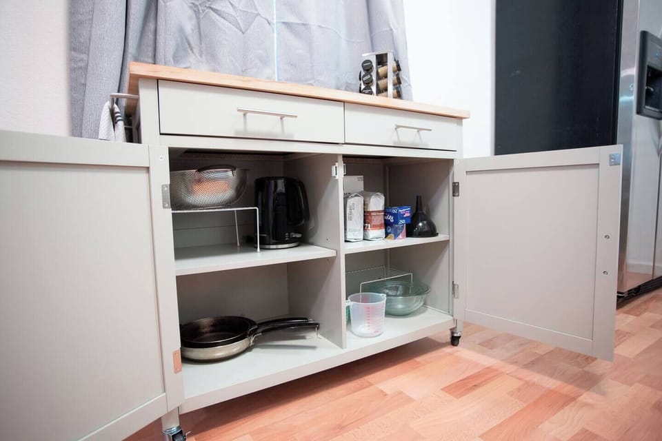 There's an extra kitchen cart that you can move around for cooking prep!! Please don't use it to surf, it doesn't work - I already tried.