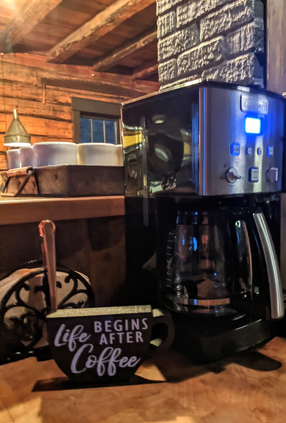 Cuisinart coffee maker with an additional Keurig coffee maker attached.