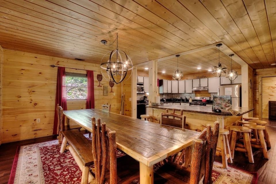 Gather around the large, custom dining table where all 18 guests can sit to enjoy your meals and fellowship together.
