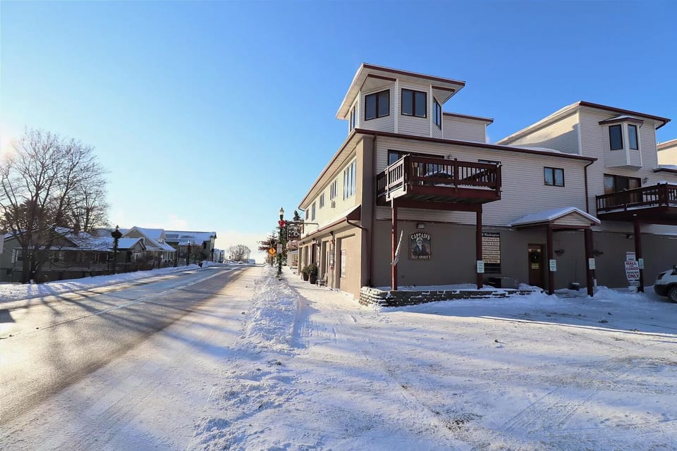 Unwind on the deck of this charming corner unit condo.