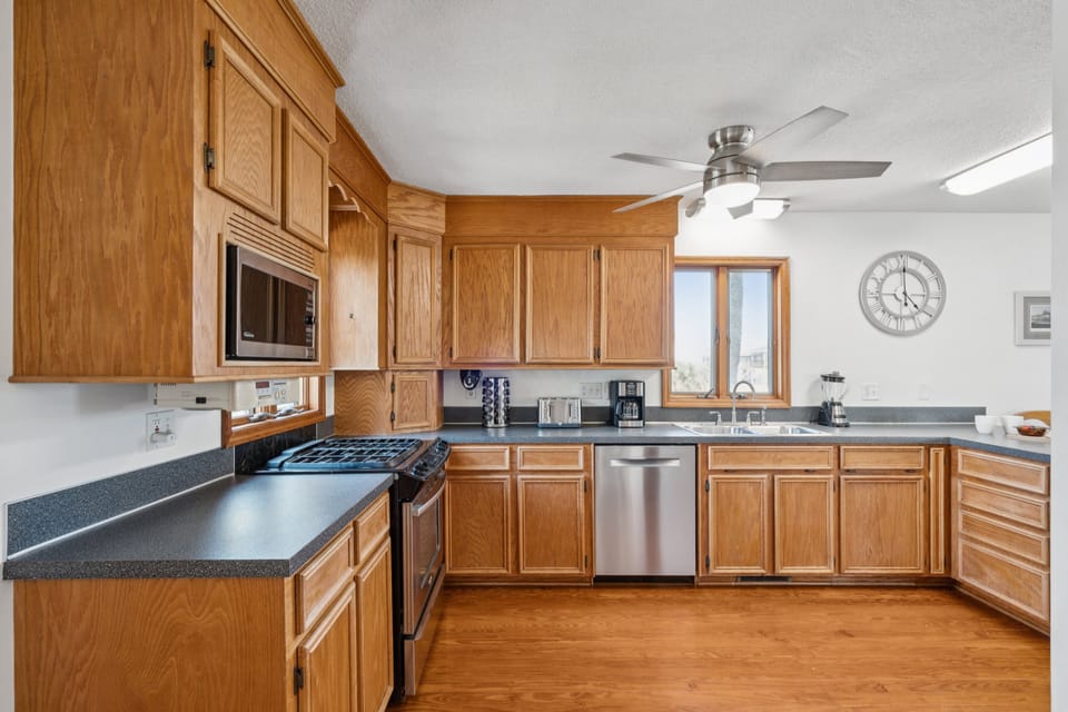 Cook with ease in this open-concept kitchen, complete with stainless steel appliances