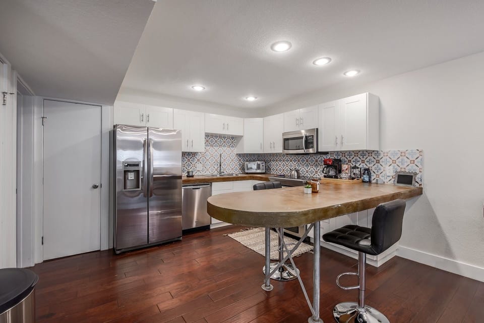 Fully-equipped kitchen stocked with everything you need to cook.
