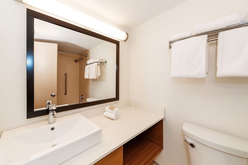 Refresh easily with a clean vanity and bright lighting.