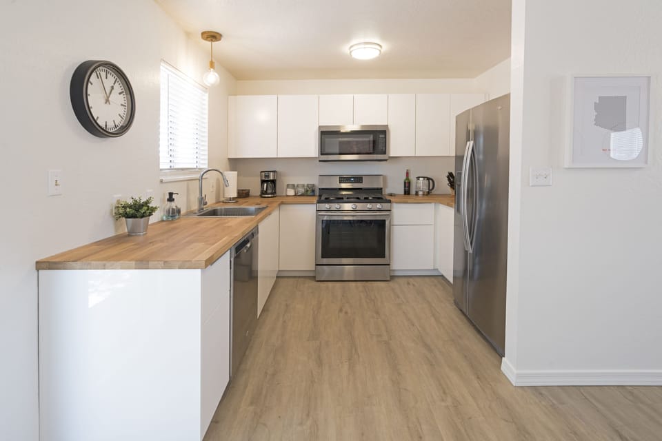 All the kitchen essentials, both drip & capsule coffee makers & filtered water.