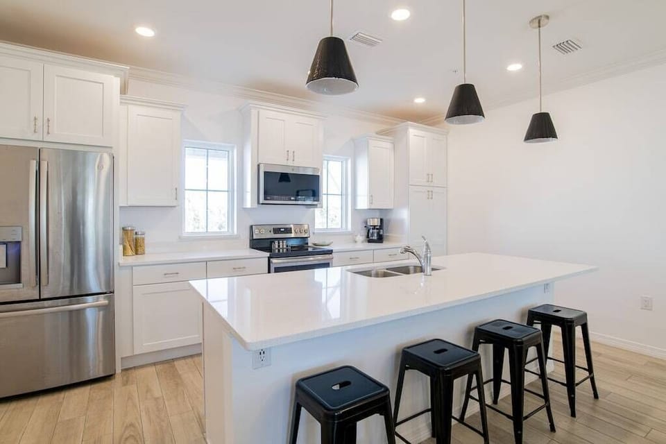 Whip up yummy breakfast treats and afternoon snacks at the large kitchen island.