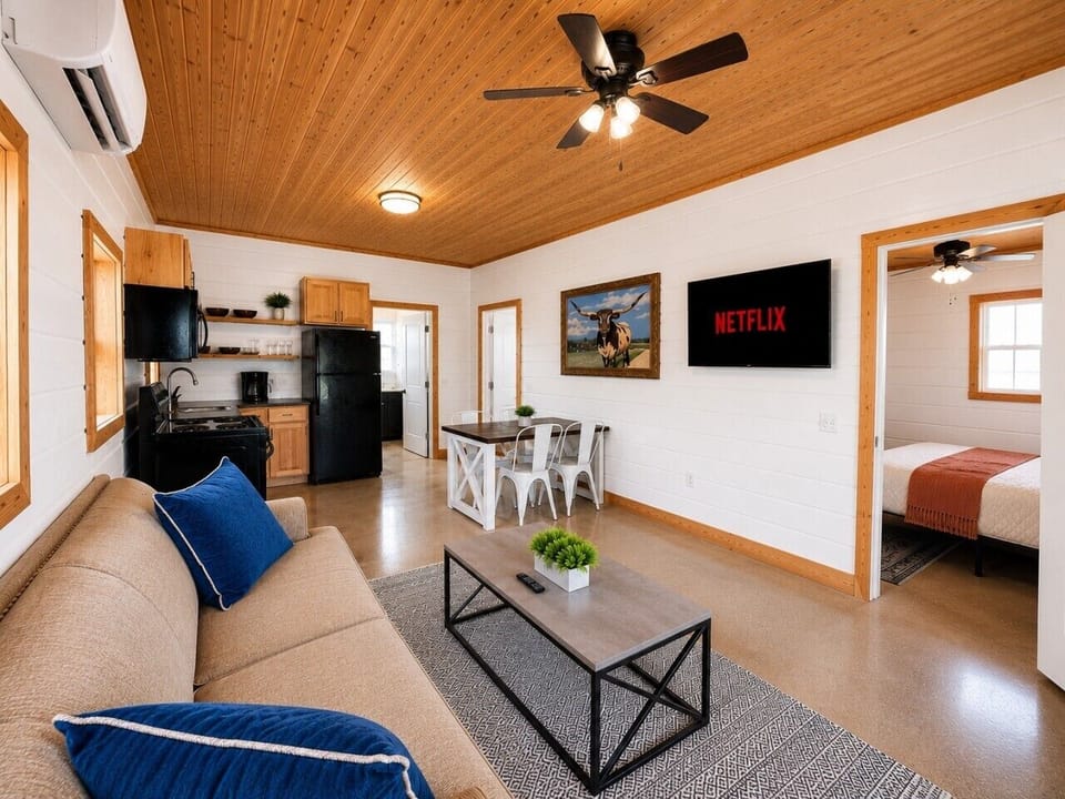 Living room has a long sofa for sleeping but ask for extra bedding if needed