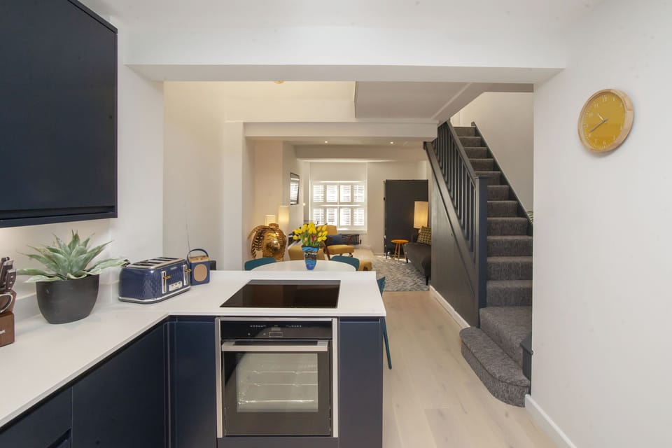 Kitchen leading to lounge