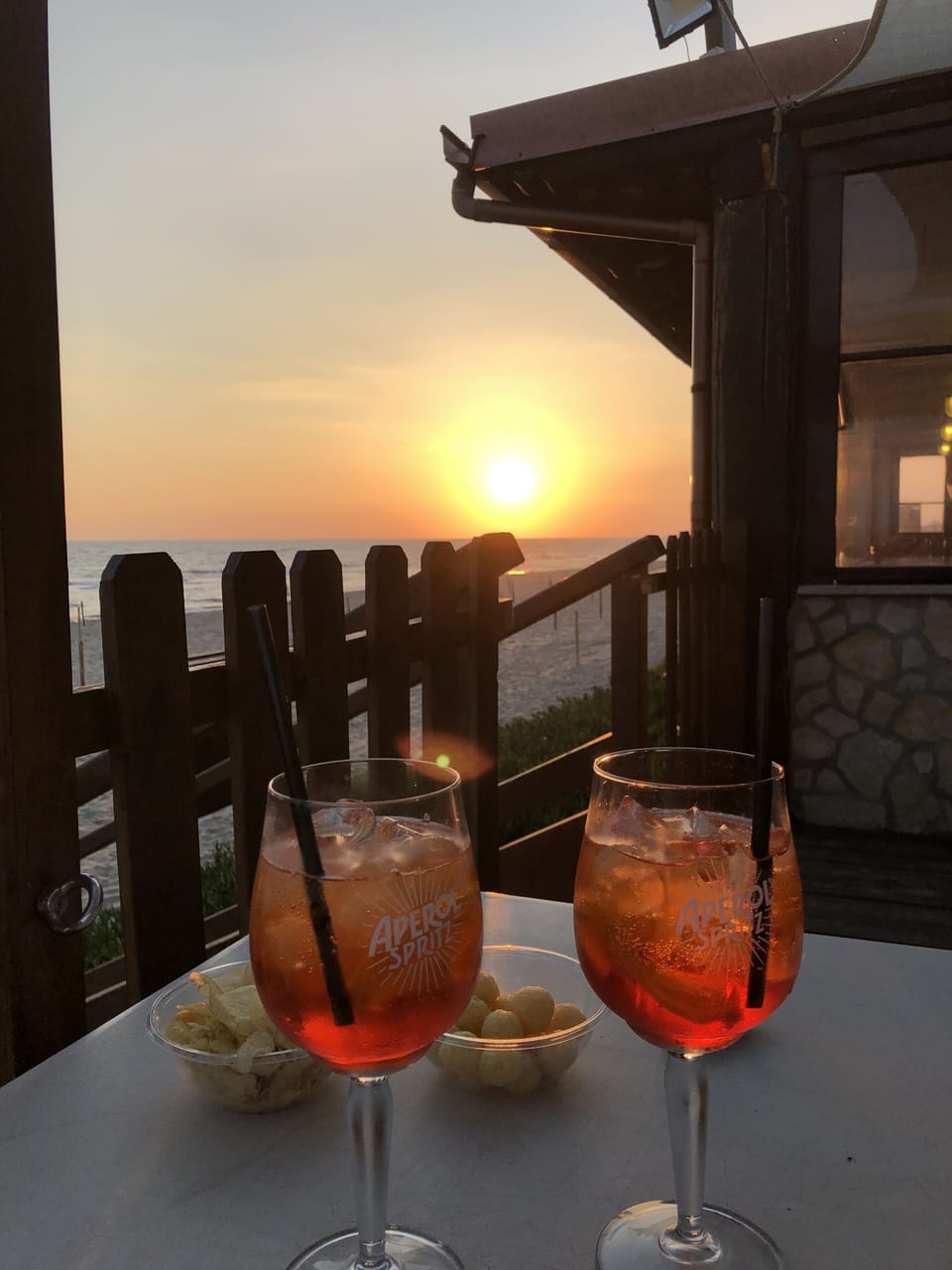 Walk down the beach for an aperitivo.
