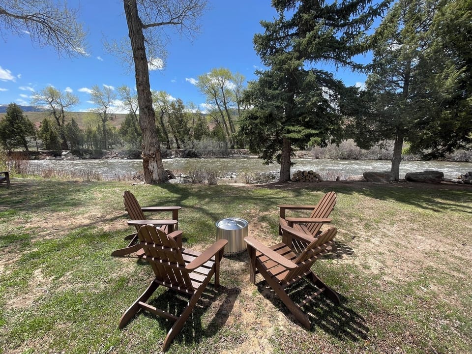 Backyard with Solo Stove fire pit, firewood provided for guest convenience
