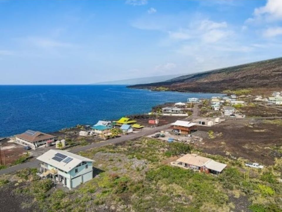 Nestle in a private protected bay where whales breach and dolphins play.