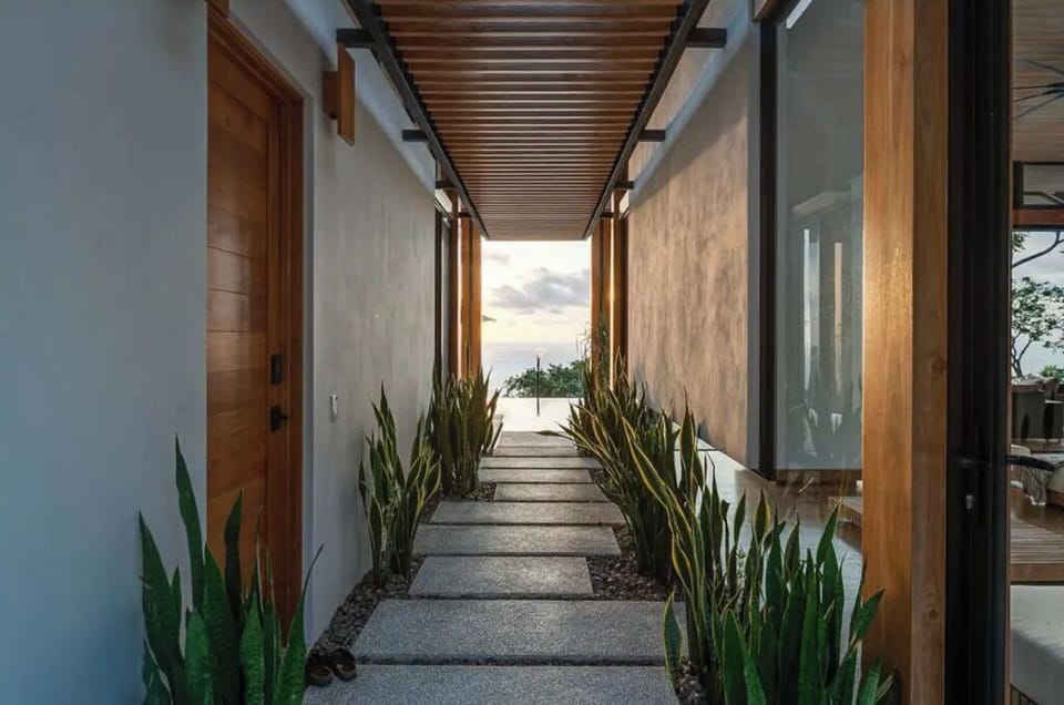 The pathway between the living dining kitchen and the VIP wing