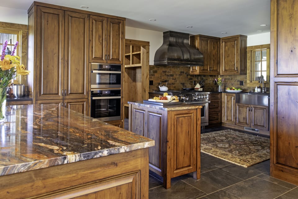 Open kitchen that looks into dining area and main living room