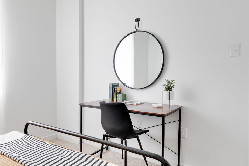 Spacious and calming bedroom w/ queen bed and work desk for when you needs a dedicated space to focus.