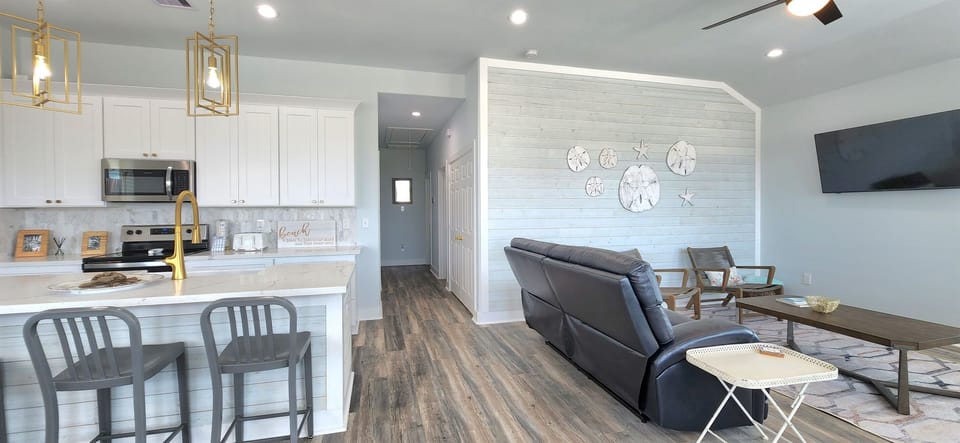 Open floor plan from kitchen to living room.
