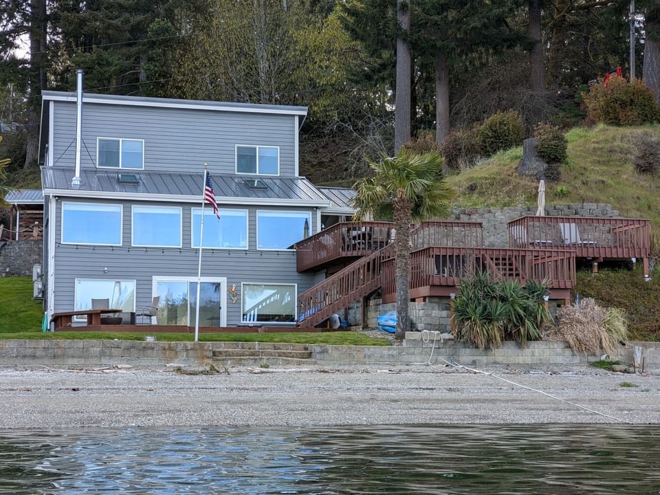 The beach is just a few yards from your back door!