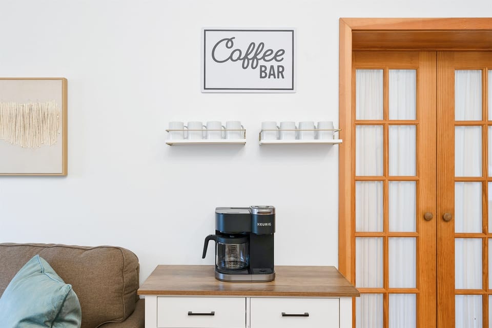 Fully loaded coffee bar ( both drip and pod coffee choices)