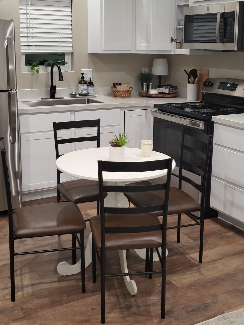 Table for dinner or workstation, four comfortable chairs