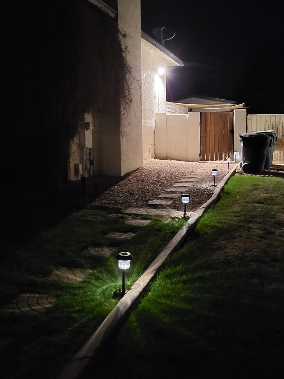 Street view walkway to gate entrance, well lite after hours, safe and cozy