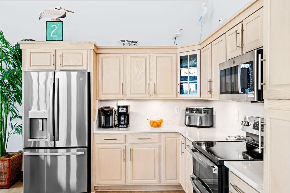 Lots of counter space and stocked kitchen for your family!