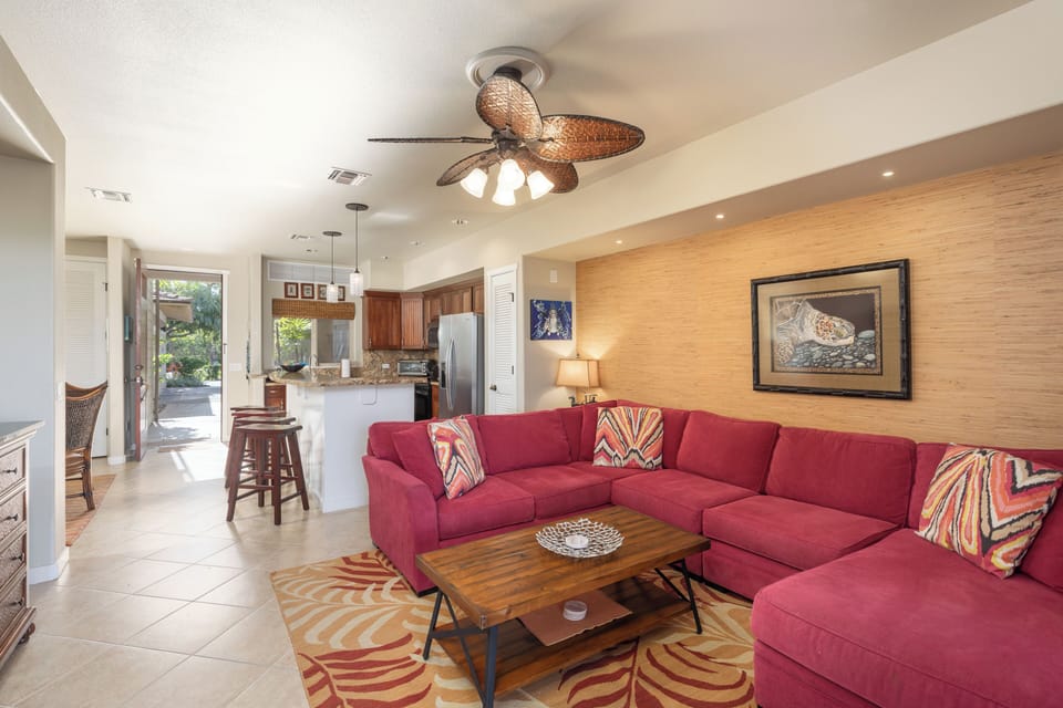 Living room with views overlooking the historic Kalahuipua'a lava fields. 