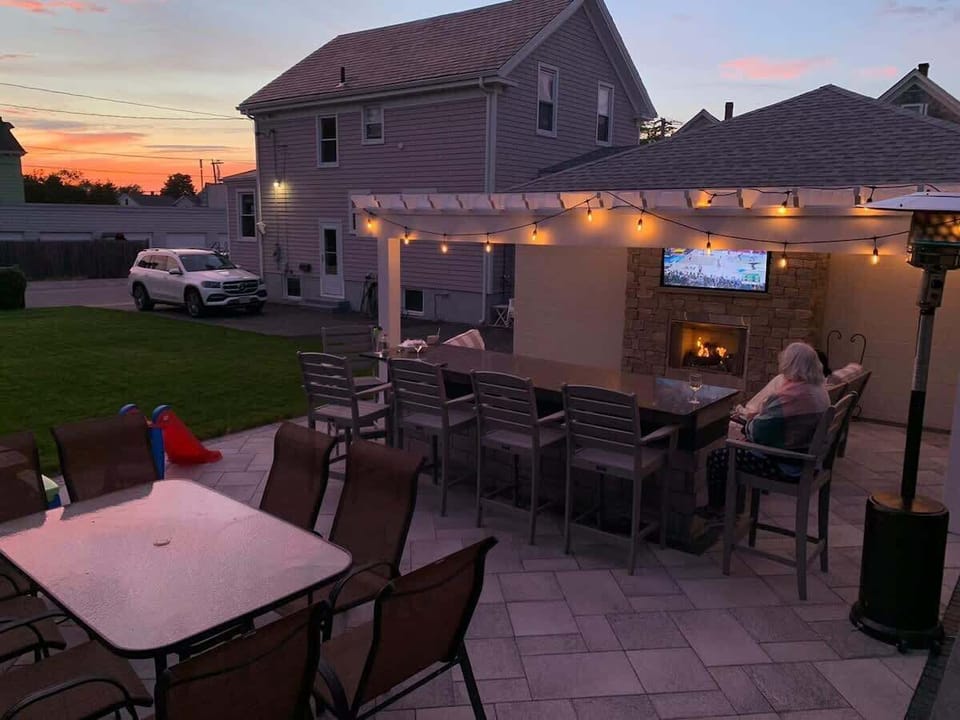 Table has been updates since this photo.  Double lot with great outdoor sitting, dinning and tv area.