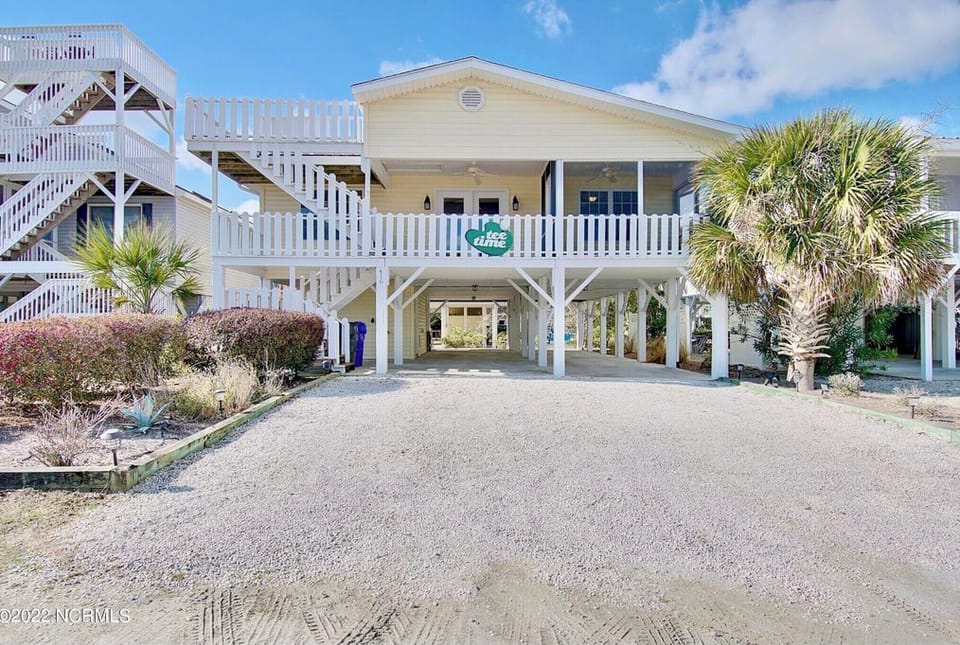 Less than 5 min walk to beach, on beach access street and nice breezes both ways