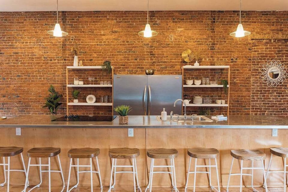 In the heart of this brick loft, culinary dreams take center stage in a sprawling industrial kitchen, where stainless steel gleams against the rugged charm of exposed brick. A perfect fusion of sophistication and raw elegance, inviting you to savor both the flavors and aesthetics of contemporary loft living. 🍴🏢 #UrbanCuisine #IndustrialChic