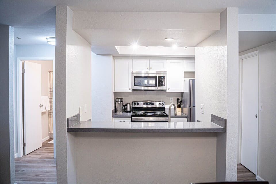 Have a few drinks at the kitchen bar while watching the designated chef in action.