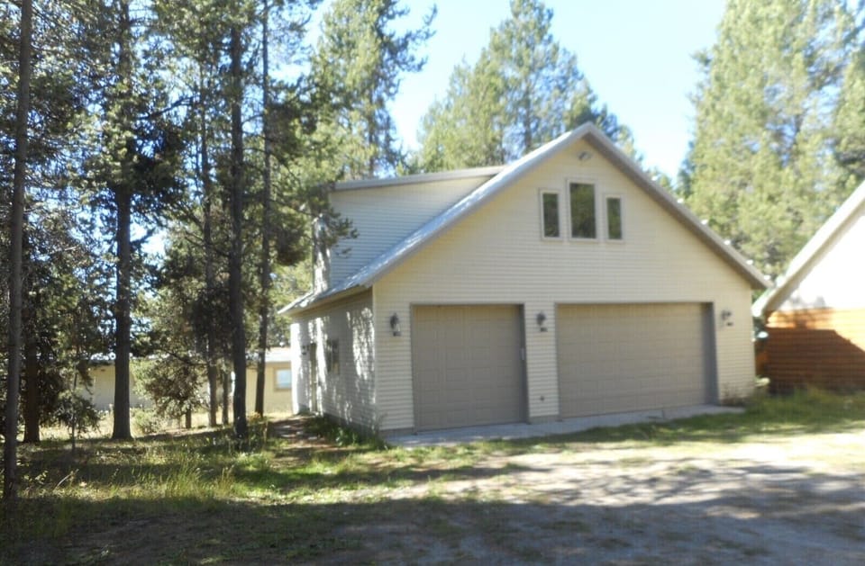 3-car detached garage with the property’s 4th bedroom above the garage 
