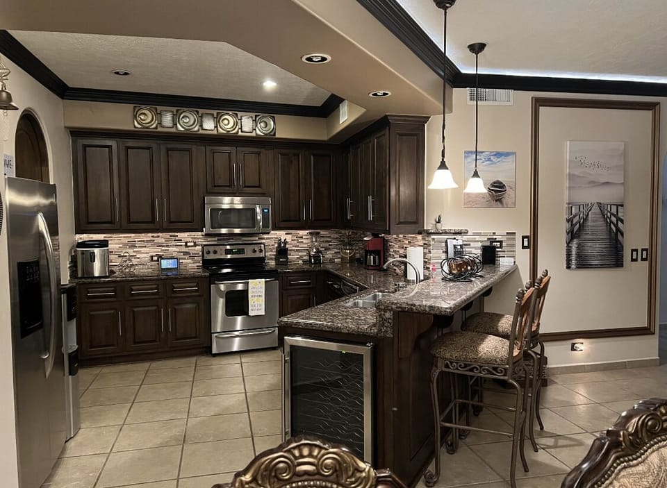 Kitchen with Under Cabinet Dimmable LED Lighting  / Stainless Steel Appliances 