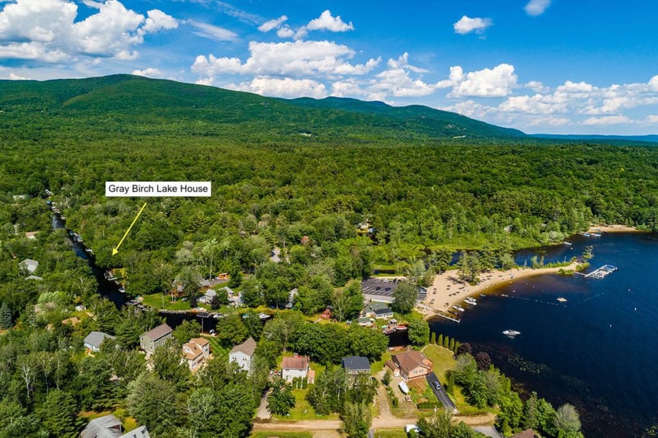 View of the community, beach, and canal