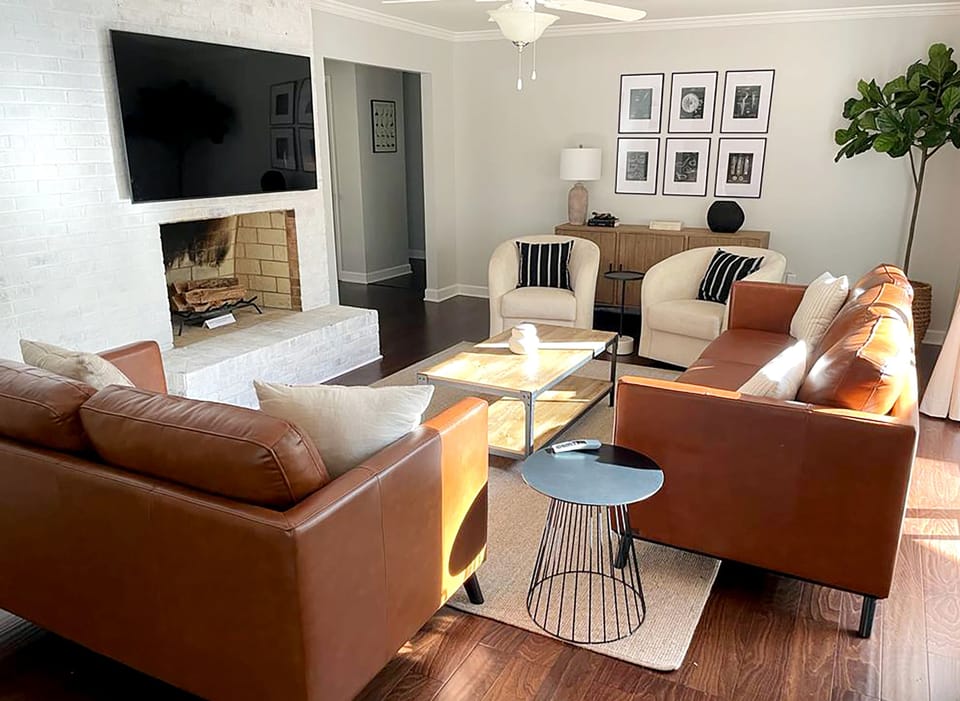 Living room that comfortably seats six. 65" T.V. 