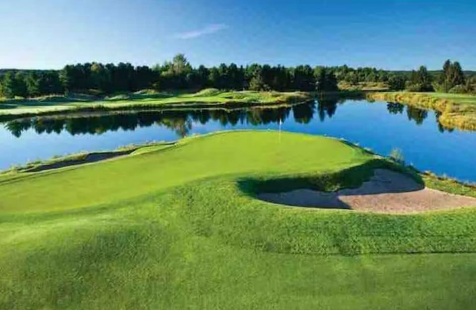 Enjoy 3 award winning golf courses @ Grand Traverse Resort- only 6 minute drive