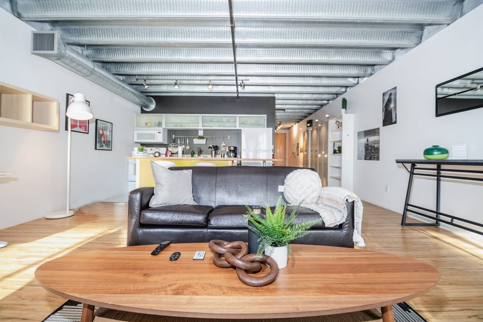 Living Room: After a long day exploring the city or mall, unwind in this cozy living room with your favorite Netflix show or music.