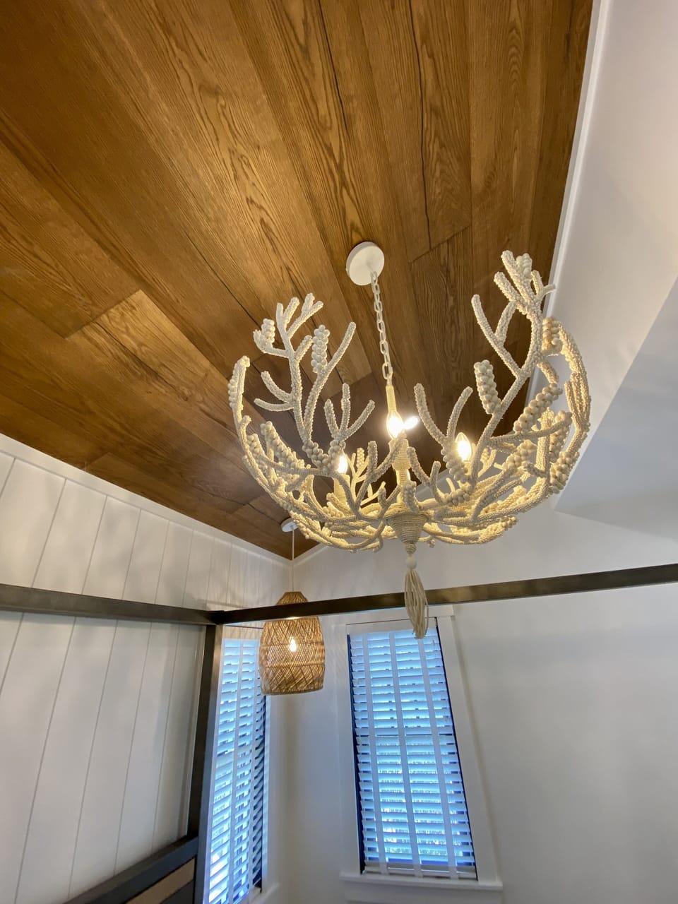 1st floor master king bedroom serena and lily coral chandelier