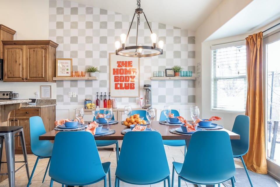 The dining area seats 8 and is a great space to enjoy a fun meal with the group 