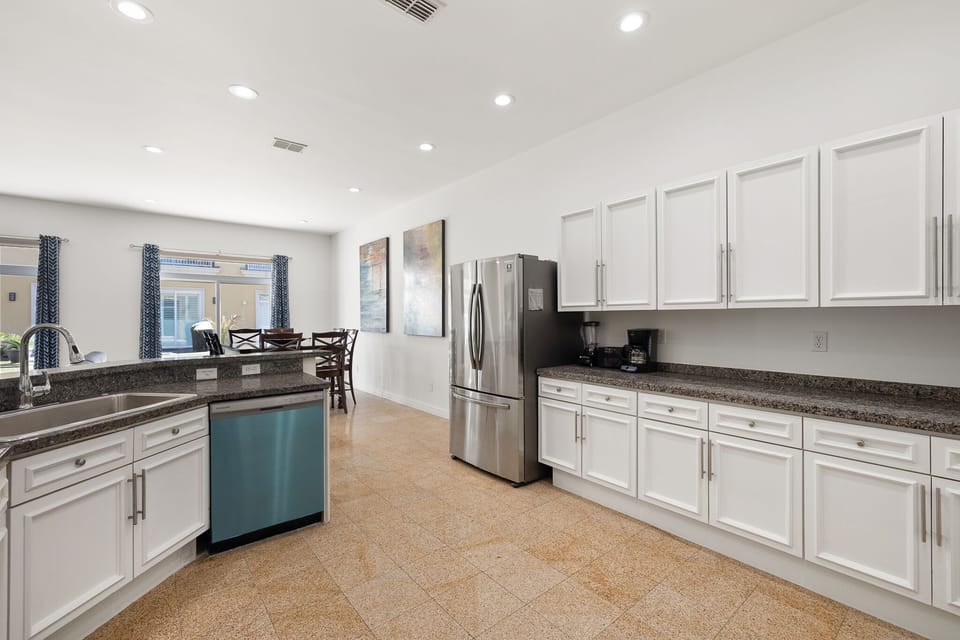Fully equipped kitchen with granite counter tops and  stainless steel appliances