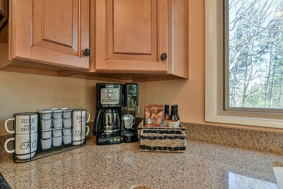 Coffee station. K-cup for one or coffee pot for all. We have a variety of  sugars, creamer, and flavored syrups for you to use.