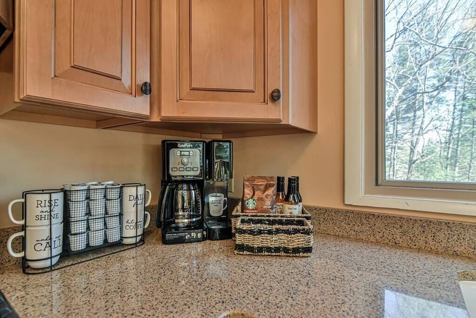 Coffee station. K-cup for one or coffee pot for all. We have a variety of  sugars, creamer, and flavored syrups for you to use.