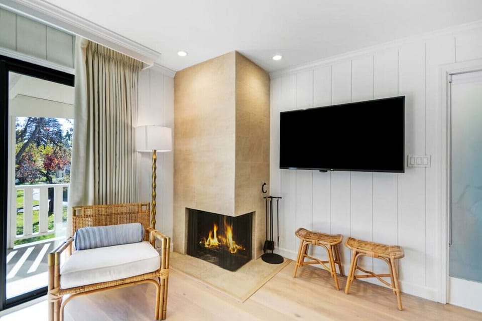 Catch a movie or stream a favorite show by a cozy fire on the 50” ROKU HDTV