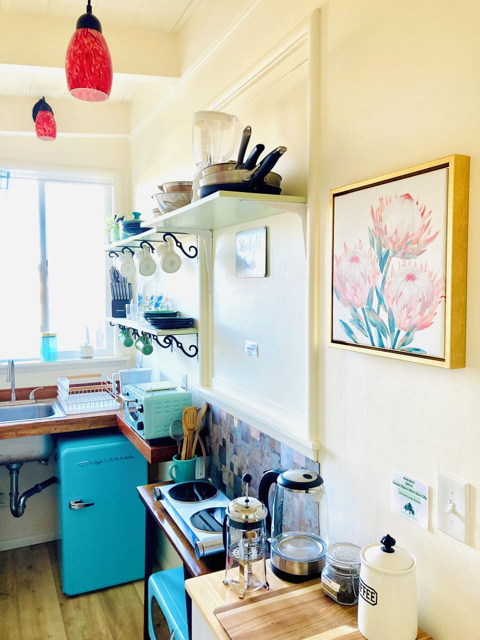 Mini fridge/freezer, coffee bar, cookware